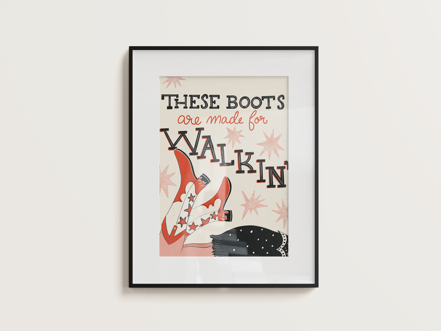 "These boots are made for walkin'" typography above a pair of red cowgirl boots.