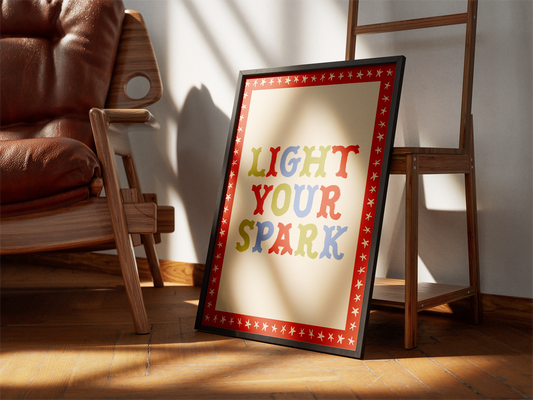 "Light Your Spark" typography with a star border.